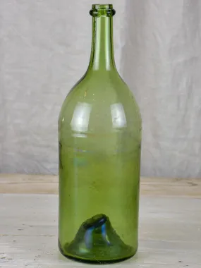 Antique French green glass bottle